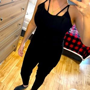 Lightly used black Guess jean jumpsuit